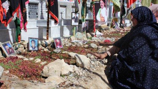 Ruqsana Bibi at the cemetery in Quetta where her sons are buried