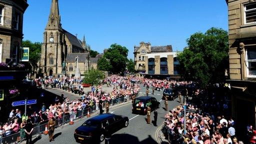 Crowds gather outside Bury Parish Church