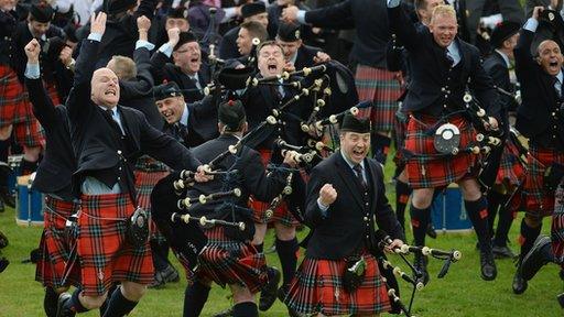 Field Marshall Montgomery band celebrate winning the 2013 World Pipe Band Championships for the third year in a row