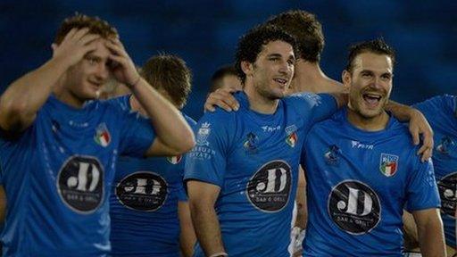 Italy's players celebrate