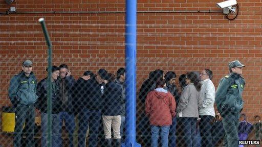 Family members and supporters of Basque separatist militant Ines del Rio wait outside a prison in Teixeiro