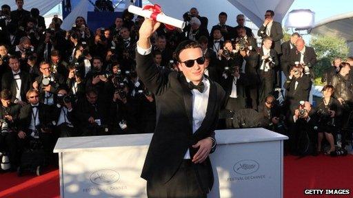 Mexican director Amat Escalante poses after being awarded Best Director award at Cannes, 26 May 2013