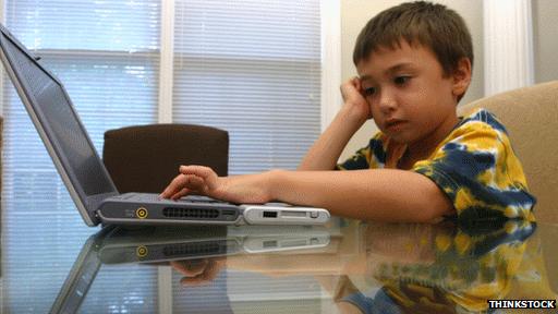 Boy using laptop