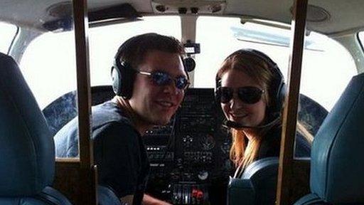 Paul Tribble and Elizabeth Geeves inside a cockpit