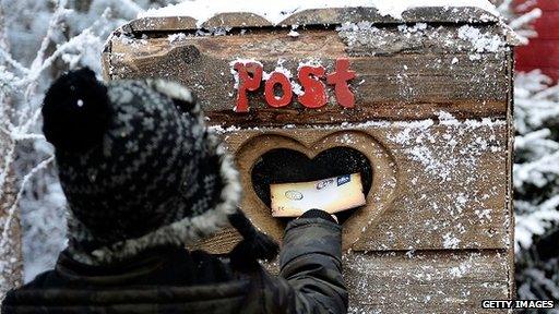 Man posting letter