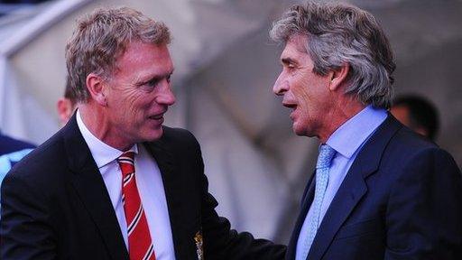 Manchester Untied manager David Moyes and Manchester City manager Manuel Pellegrini