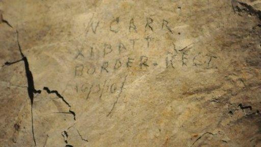 The name of William Carr, dated 16 March 1916 on the wall in W Shaft Chamber