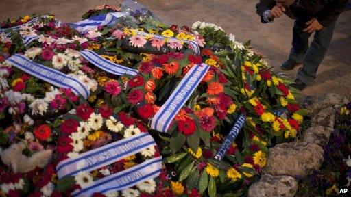 Flowers on grave of Ariel Sharon