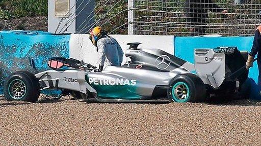 Hamilton climbs out of his Mercedes