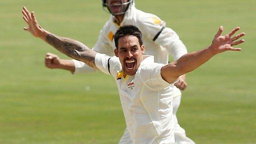 Australia bowler Mitchell Johnson celebrates taking a wicket against South Africa