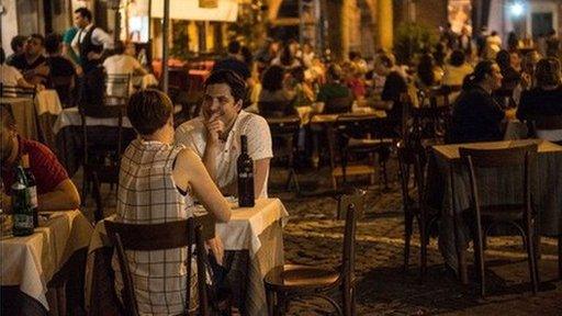 People outside a restaurant