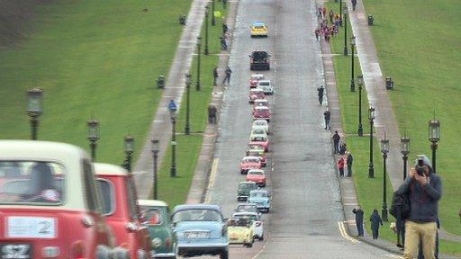 The cavalcade leaves Stormont, heading for the city hall