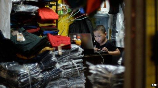 Chinese boy using computer