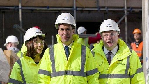 Ed Miliband (lcentre), Rachel Reeves (left) and Ed Balls (right) visit a building site in London