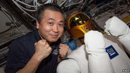 Jaxa's Commander Wakata poses with Robonaut