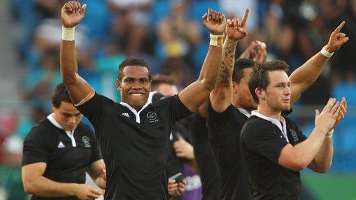 New Zealand celebrate winning gold at the 2010 Commonwealth Games rugby sevens.