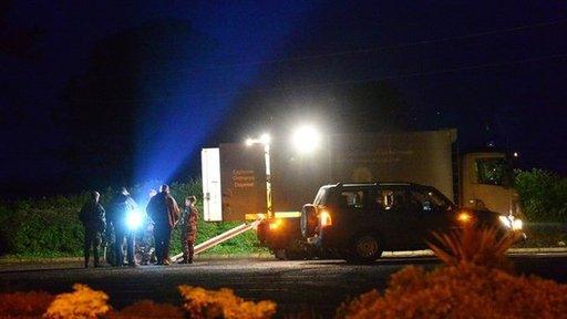 Five men were arrested by police on Sunday night after a suspect device was discovered