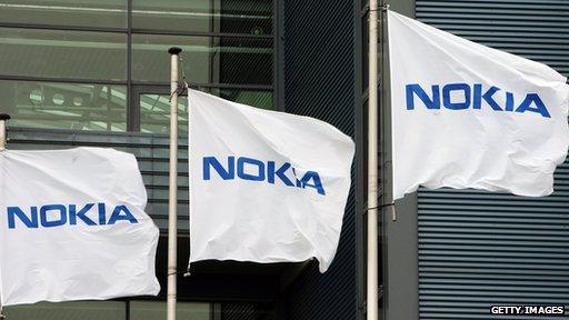 Nokia flags at the company's headquarters