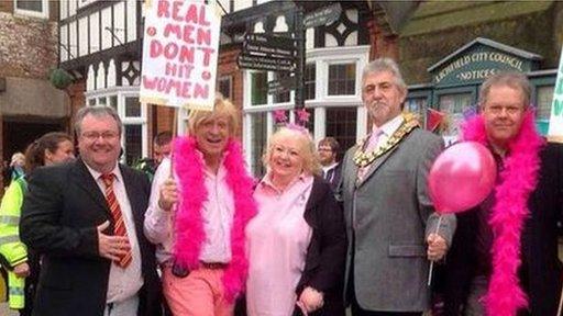 Mr Fabricant tweeted a picture of himself demonstrating against domestic violence in Lichfield last year