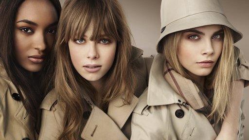 Models wearing Burberry trench-coats