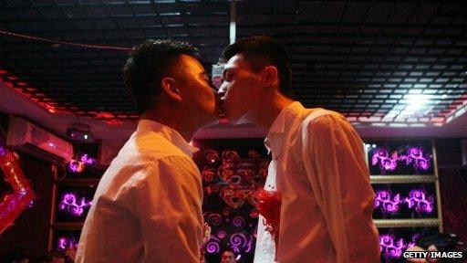 gay couple kissing