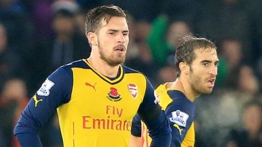 Arsenal's Aaron Ramsey and Mathieu Flamini