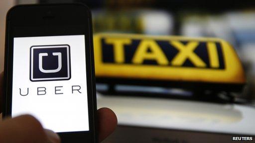 Uber logo and taxi light