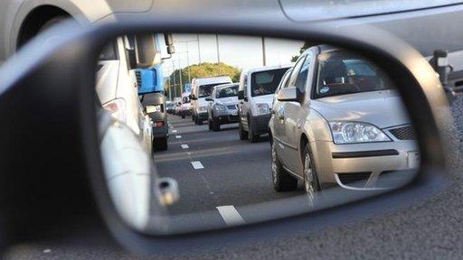 Traffic jam in wing mirror