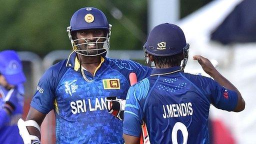 Thisara Perera (left) and Jeevan Mendis celebrate Sri Lanka's victory