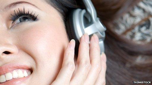 Woman listening to podcast