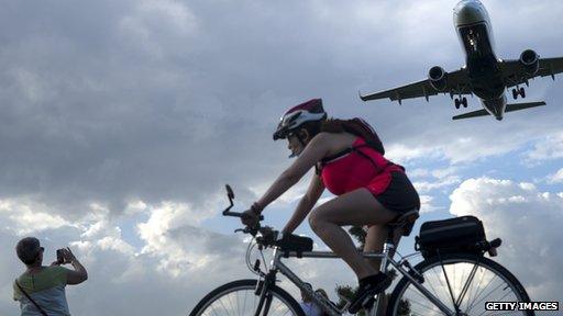 plane, bike, photographer