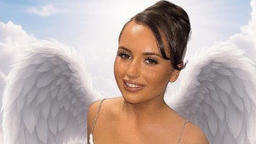 Courtney Angus, who has dark hair tied up. A pair of angel wings appear behind her in the photo, in which she is smiling.