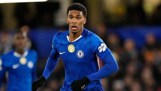 Josh Acheampong running in the match against Barcelona