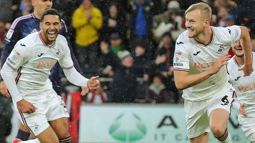 Ben Cabango and Harry Darling celebrate the latter's goal against Leeds 