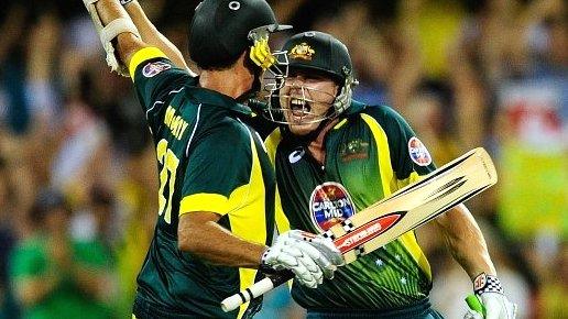 James Faulkner and Clint McKay celebrate Australia's victory