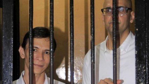 Ferdinant Tjiong and Neil Bantleman in a holding cell at court (19 March 2015)