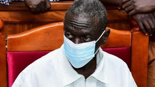 Ugandan opposition politician Kizza Besigye sits in front of the dock at the High Court Civil Division at the Twed Towers in Kampala, Uganda February 19, 2025. 