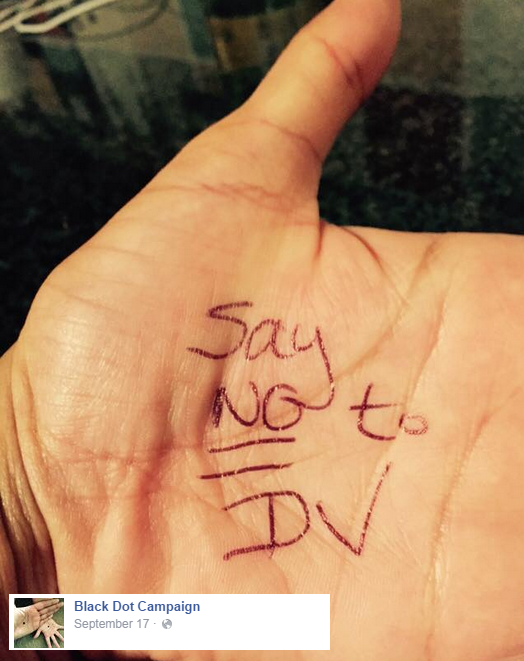 Instead of drawing a black dot on their palms, the campaign's founder is urging supporters and survivors who aren't in immediate danger to write "Say no to domestic violence"