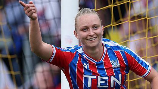 Elise Hughes celebrates scoring for Crystal Palace