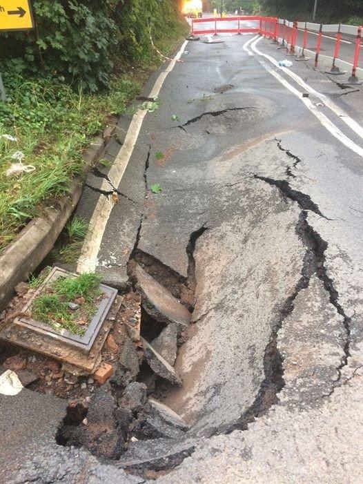 Collapsed section of A38 due to burst water main