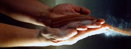 A leather belt hitting hands
