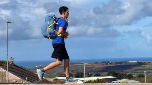 A man running the length of the UK