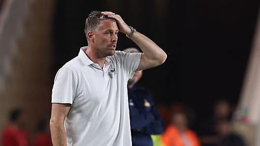Boro boss Rob Edwards with head in hand as his side are beaten by Doncaster