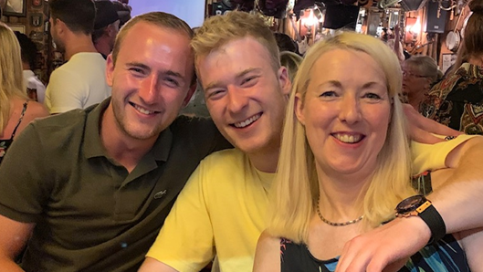 Harry Marshall, centre, with brother Tom and mother Alison