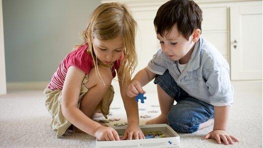 A boy and girl playing