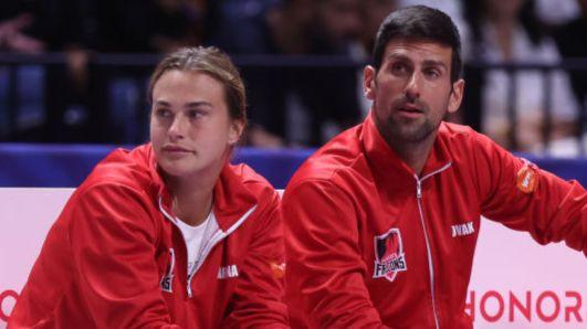 Aryna Sabalenka and Novak Djokovic sit together at a World Tennis League event in Dubai