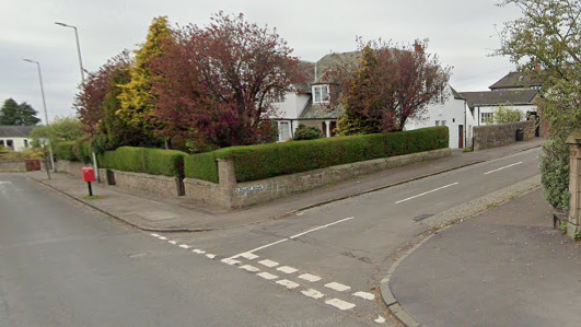 The junction of a main road and a side street
