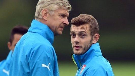 Arsenal's Arsene Wenger and Jack Wilshere