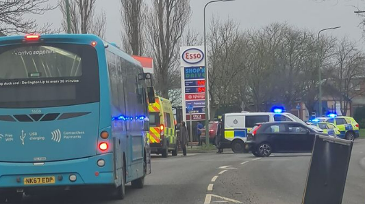 Police vehicles outside of the Esso petrol station