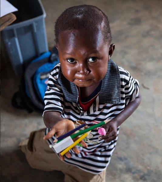 Jake holds up pencils to the camera